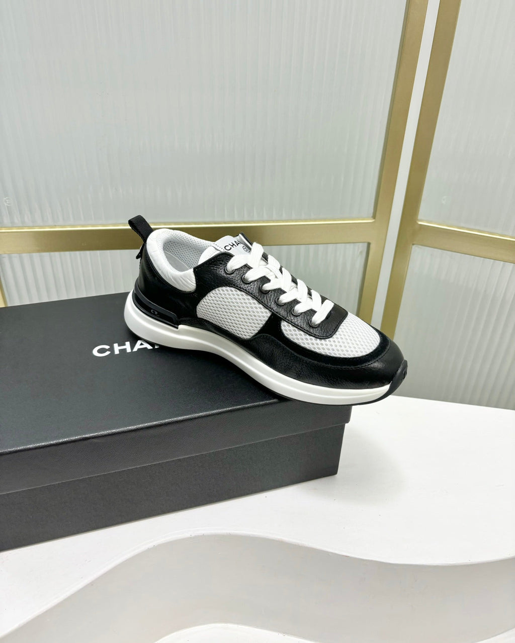 CHANEL SNEAKER IN BLACK CALFSKIN AND GREY BREATHABLE MESH